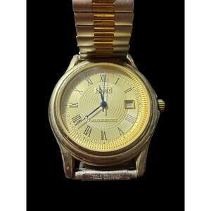 Stauer Gold Tone Quartz Wristwatch Two Tone Expansion Band Roman Numerals Date